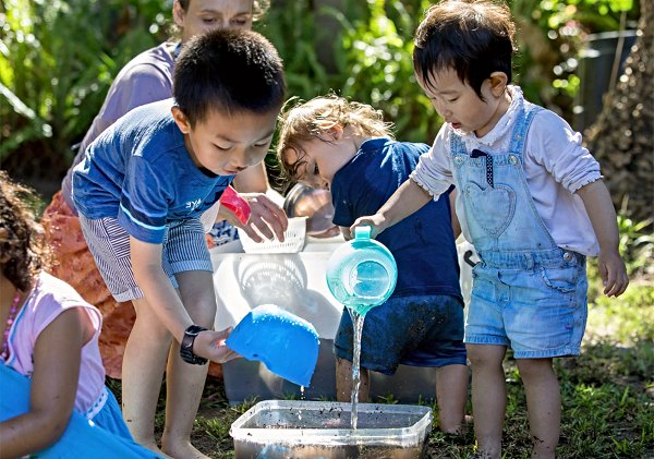 children playing with water