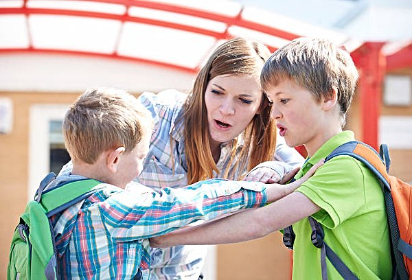 Kids are fighting and mother stopping