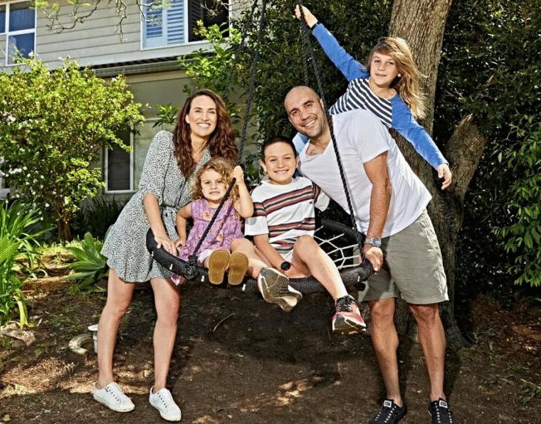 The family is enjoying together in a garden