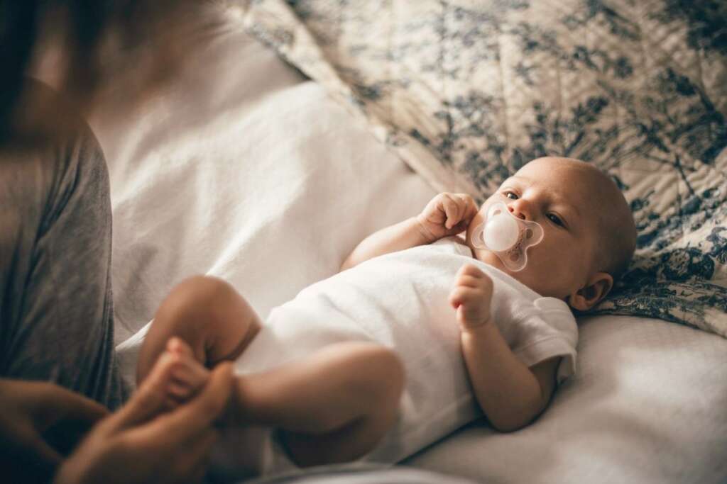now-born is looking at mother