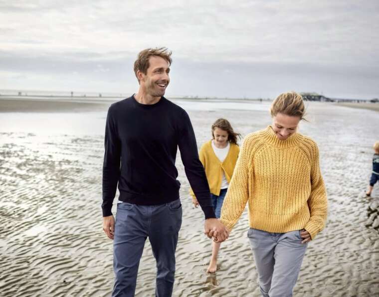 family enjoying on a beach