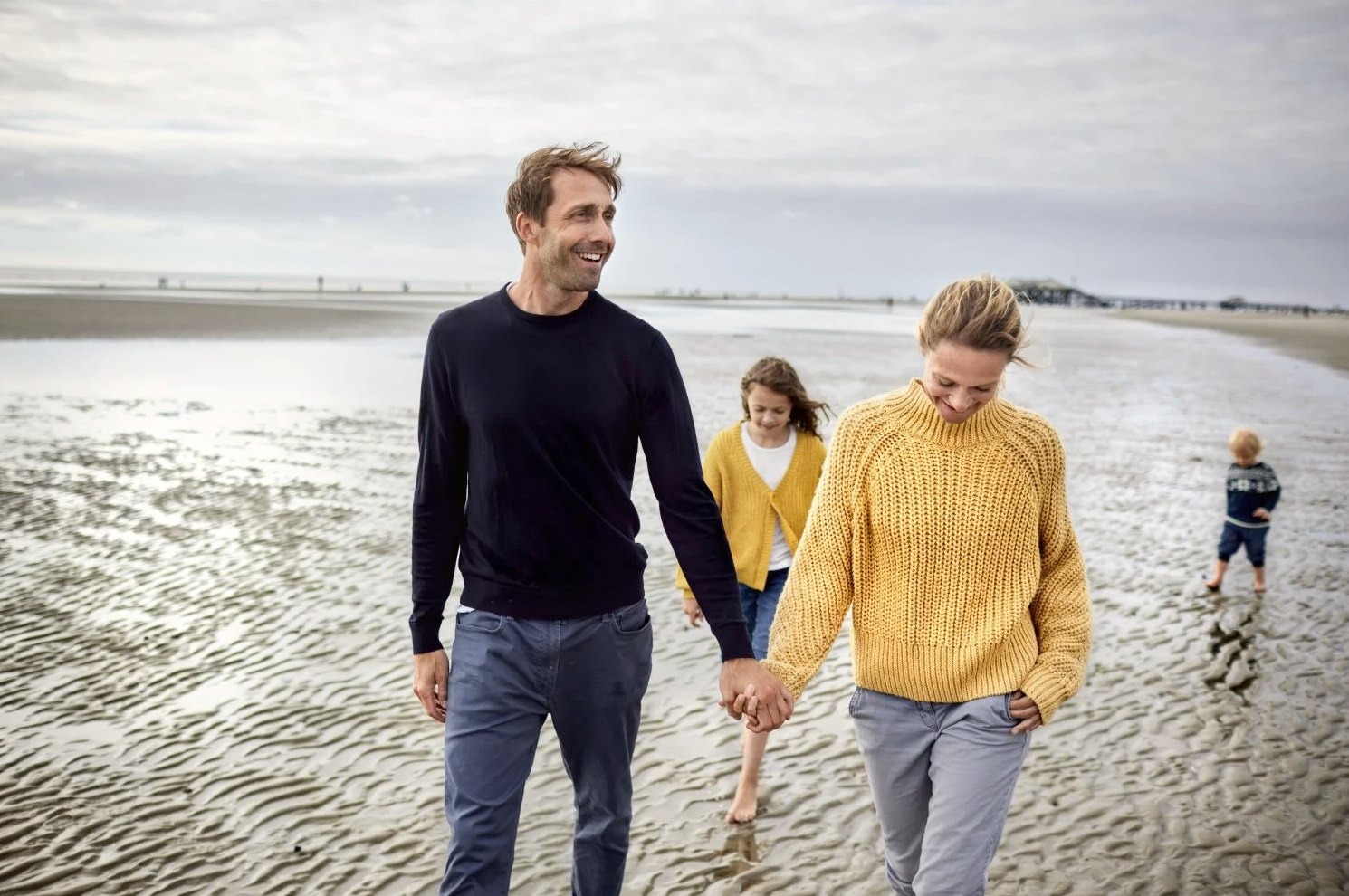 family enjoying on a beach