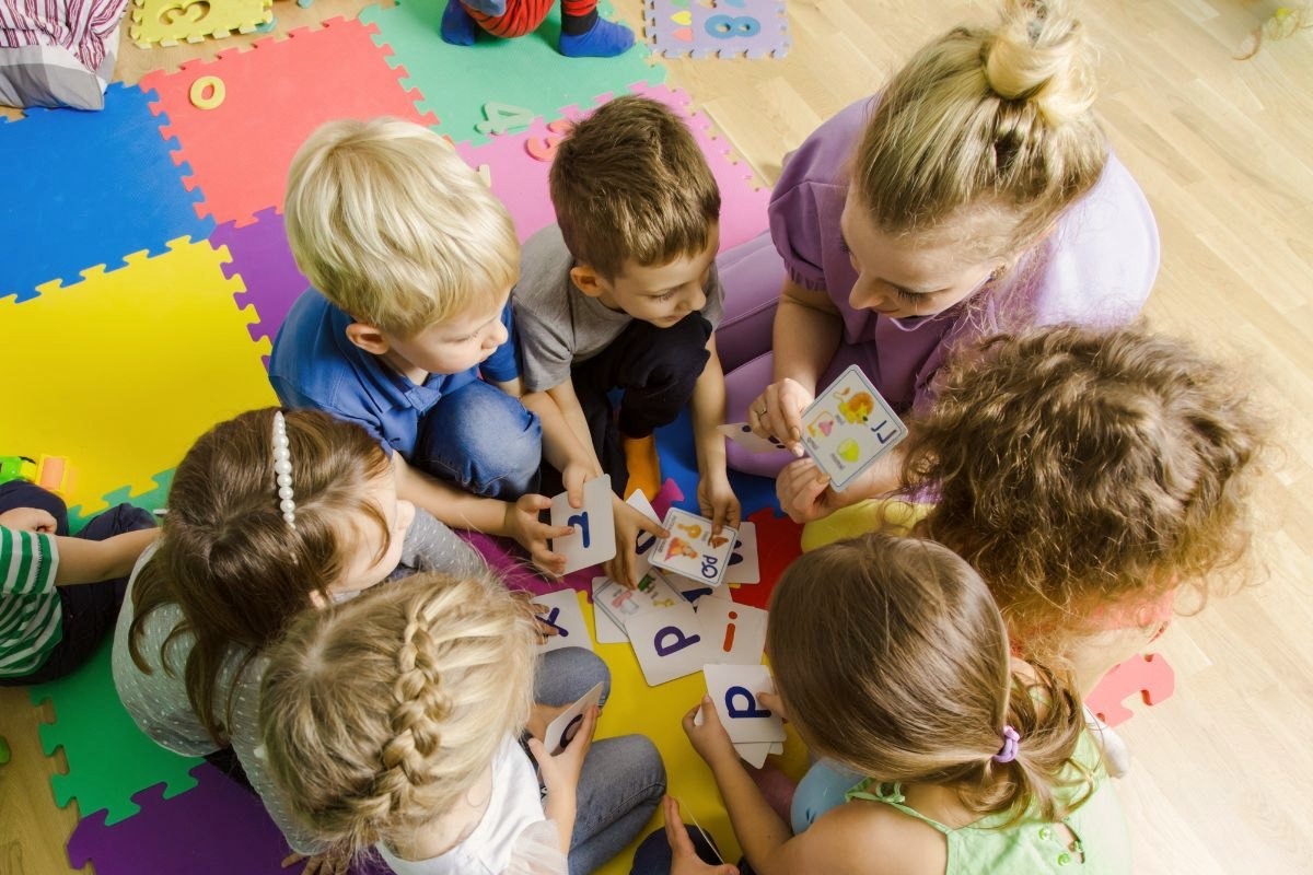 teacher is promoting early education of children